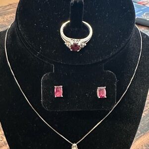 Retired 4-piece Garnet and White Topaz set. Just in time for January babies. 💝